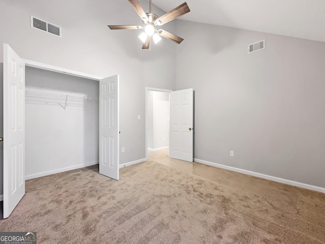 7006 Mahonia Pl, Lithonia, GA 30038 - unfurnished bedroom with high vaulted ceiling, carpet, a closet, baseboards, and a ceiling fan