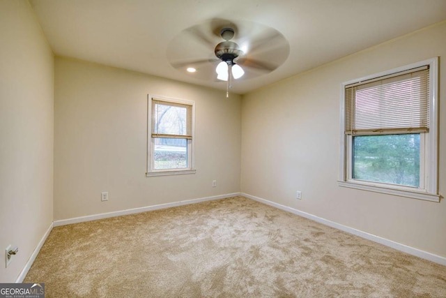 1693 Montreal Rd, Tucker, GA 30084 - empty room with carpet flooring, baseboards, and a ceiling fan