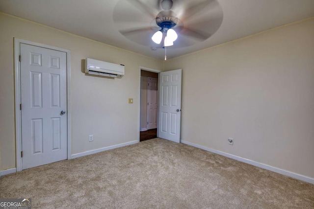 1693 Montreal Rd, Tucker, GA 30084 - unfurnished bedroom featuring a wall unit AC, carpet flooring, baseboards, and a ceiling fan