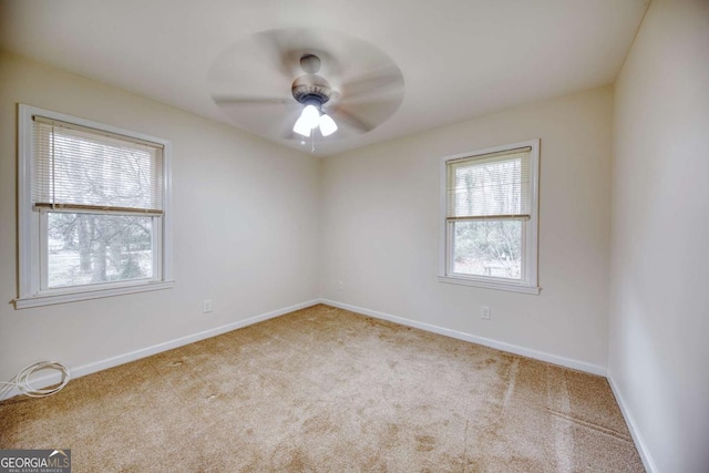 1693 Montreal Rd, Tucker, GA 30084 - carpeted empty room with a ceiling fan and baseboards