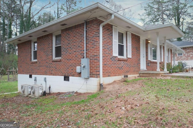 1693 Montreal Rd, Tucker, GA 30084 - view of property exterior with brick siding, crawl space, and ac unit