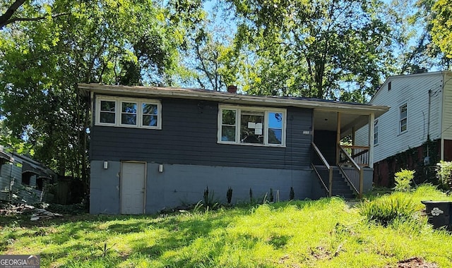 view of front of property with stairs