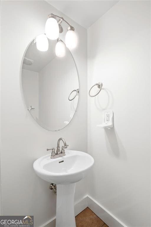 221 Semel Cir NW Unit 273, Atlanta, GA 30309 - bathroom featuring tile patterned flooring and baseboards