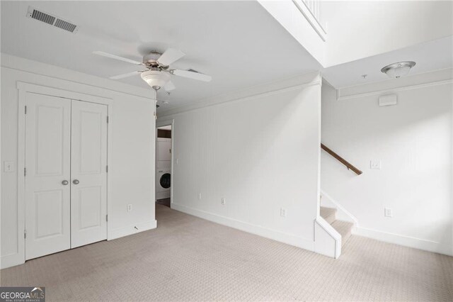 221 Semel Cir NW Unit 273, Atlanta, GA 30309 - unfurnished living room featuring carpet floors, a ceiling fan, and baseboards
