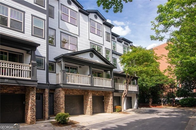 221 Semel Cir NW Unit 273, Atlanta, GA 30309 - view of property with a garage and driveway