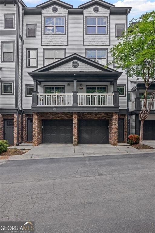 221 Semel Cir NW Unit 273, Atlanta, GA 30309 - multi unit property featuring a garage and driveway