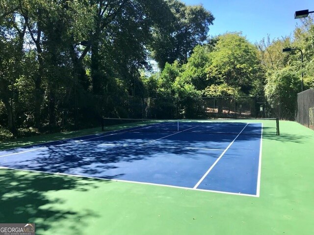 221 Semel Cir NW Unit 273, Atlanta, GA 30309 - view of tennis court featuring fence