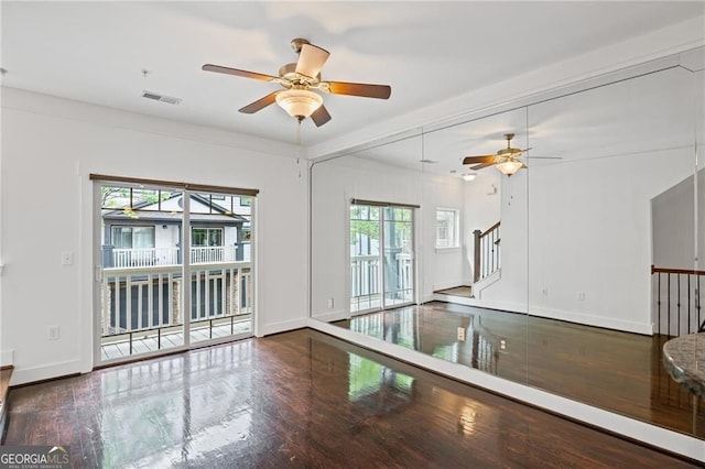 221 Semel Cir NW Unit 273, Atlanta, GA 30309 - spare room with a ceiling fan, wood finished floors, baseboards, and stairs