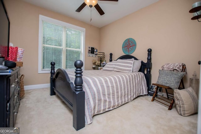 bedroom with carpet, baseboards, and ceiling fan