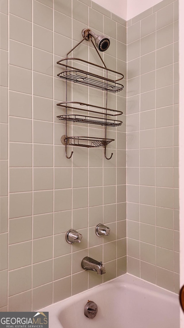 full bath with bathing tub / shower combination