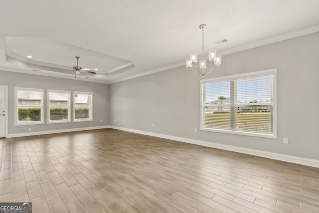 125 The Villas Way, Kingsland, GA 31548 - unfurnished room with a raised ceiling, a chandelier, wood finished floors, baseboards, and ornamental molding