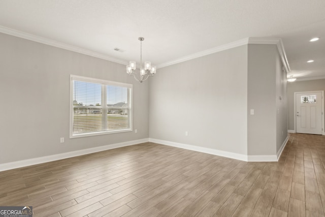 125 The Villas Way, Kingsland, GA 31548 - empty room with crown molding, a chandelier, light wood-type flooring, baseboards, and recessed lighting