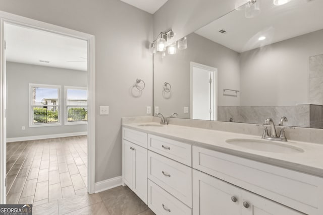 125 The Villas Way, Kingsland, GA 31548 - bathroom with double vanity and baseboards
