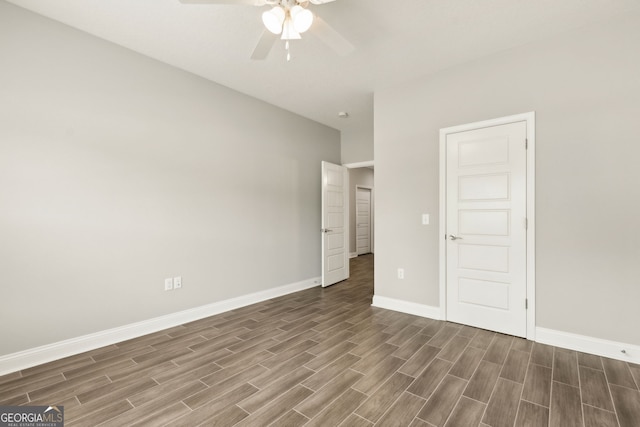 125 The Villas Way, Kingsland, GA 31548 - unfurnished bedroom featuring baseboards, wood finished floors, and ceiling fan