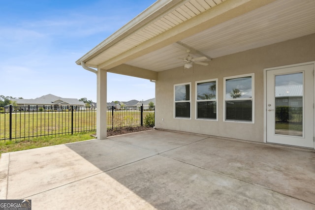 125 The Villas Way, Kingsland, GA 31548 - view of patio featuring ceiling fan and fence