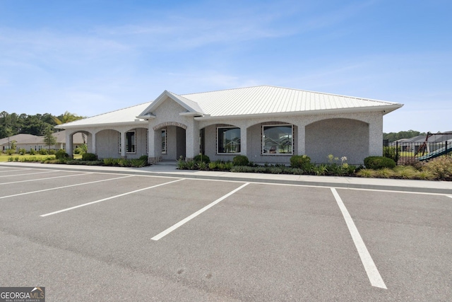 125 The Villas Way, Kingsland, GA 31548 - view of building exterior with uncovered parking and fence