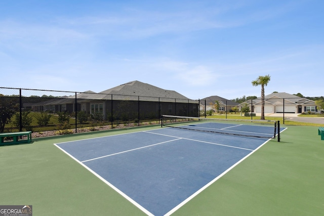 125 The Villas Way, Kingsland, GA 31548 - view of tennis court with fence and a residential view