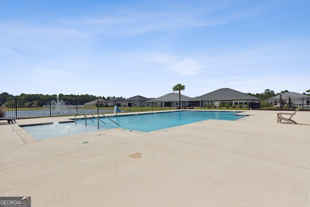 125 The Villas Way, Kingsland, GA 31548 - community pool featuring a patio