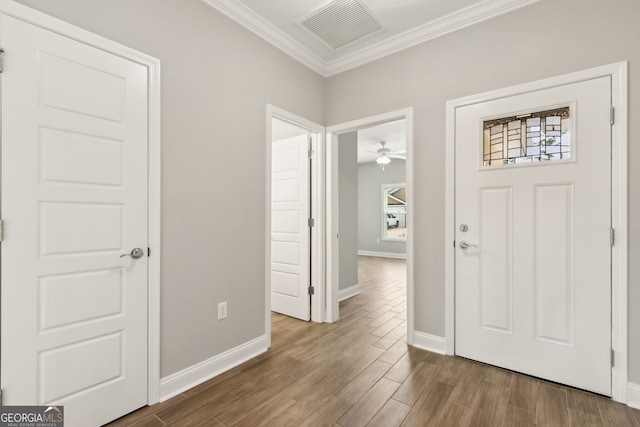 125 The Villas Way, Kingsland, GA 31548 - foyer entrance with crown molding, wood finished floors, and a ceiling fan