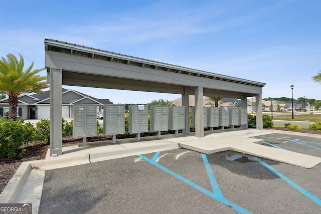 125 The Villas Way, Kingsland, GA 31548 - surrounding community featuring mail area, uncovered parking, and a residential view