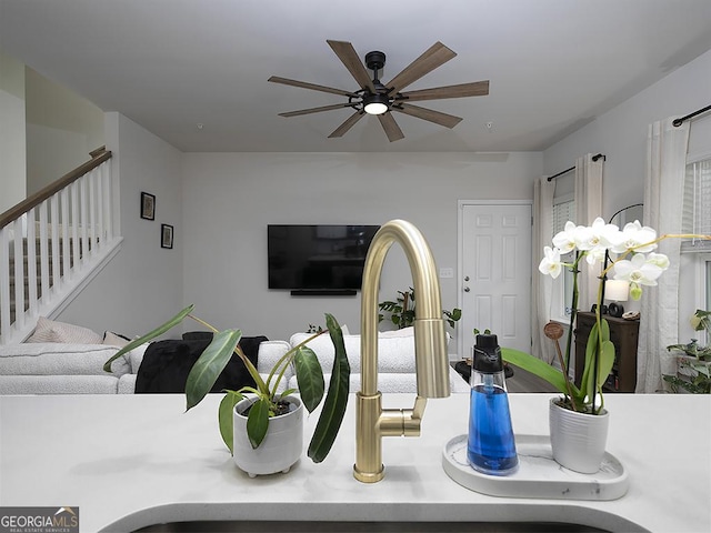 2108 Remy Ct, Kennesaw, GA 30144 - living room with a ceiling fan and stairway