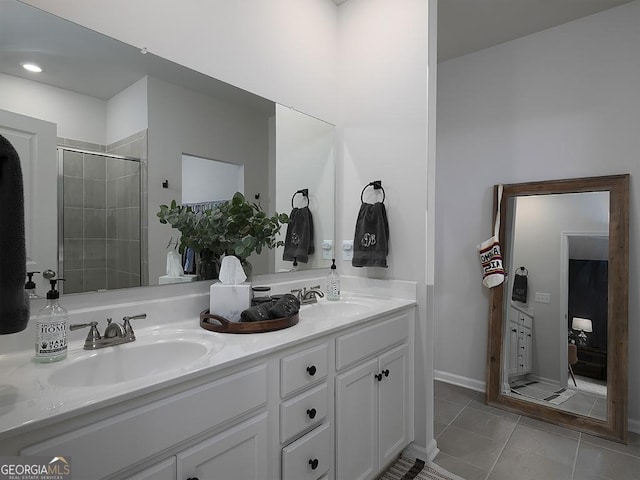 2108 Remy Ct, Kennesaw, GA 30144 - bathroom with double vanity, tile patterned floors, and a stall shower