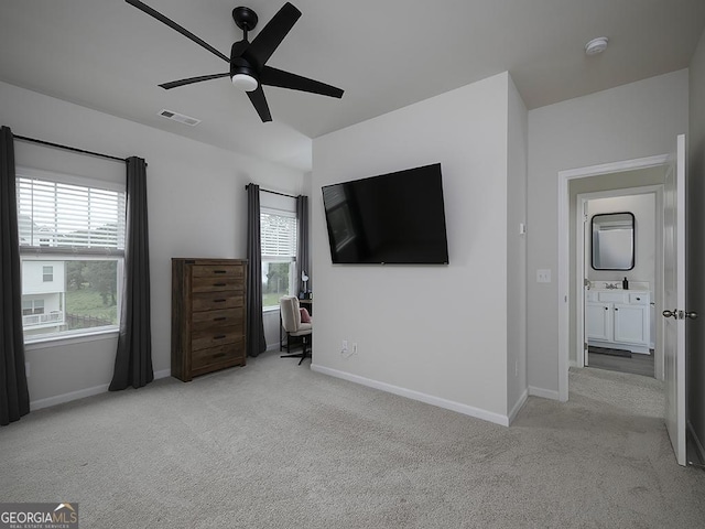 2108 Remy Ct, Kennesaw, GA 30144 - unfurnished bedroom featuring light colored carpet, baseboards, and a ceiling fan