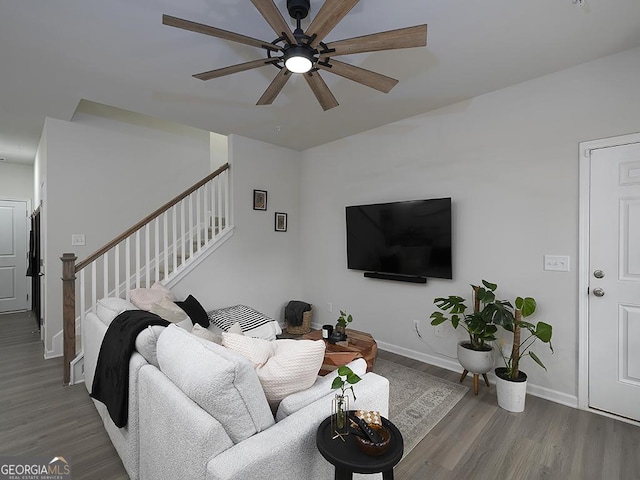 2108 Remy Ct, Kennesaw, GA 30144 - living room featuring stairs, a ceiling fan, wood finished floors, and baseboards
