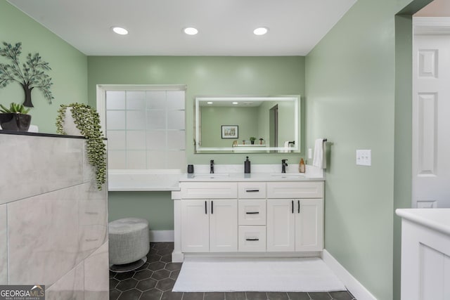 900 Bay Laurel Cir, Warner Robins, GA 31088 - bathroom featuring double vanity, tile patterned flooring, baseboards, and recessed lighting