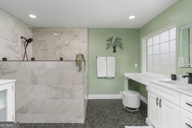 900 Bay Laurel Cir, Warner Robins, GA 31088 - full bath featuring walk in shower, vanity, recessed lighting, baseboards, and tile patterned flooring