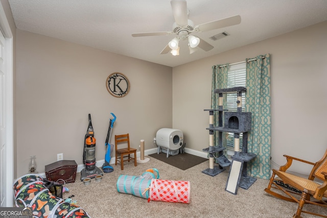900 Bay Laurel Cir, Warner Robins, GA 31088 - playroom featuring carpet, a ceiling fan, and baseboards