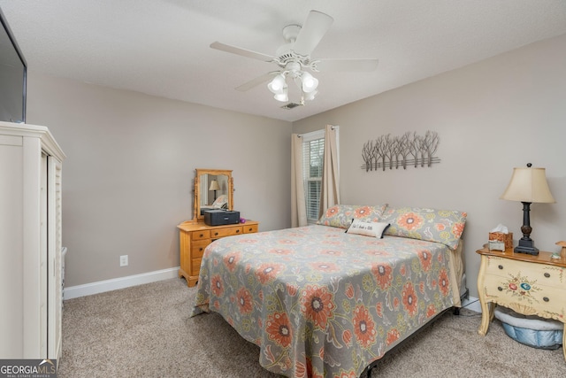 900 Bay Laurel Cir, Warner Robins, GA 31088 - bedroom featuring carpet, baseboards, and a ceiling fan