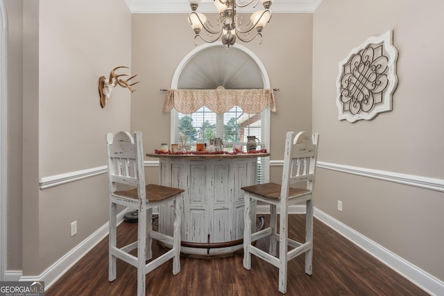 900 Bay Laurel Cir, Warner Robins, GA 31088 - dining space with wood finished floors, a chandelier, baseboards, and ornamental molding
