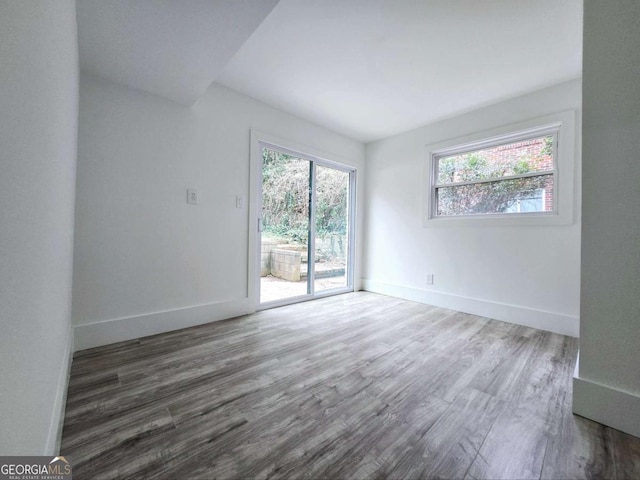 2400 Glenrock Dr, Decatur, GA 30032 - unfurnished room with wood finished floors and baseboards