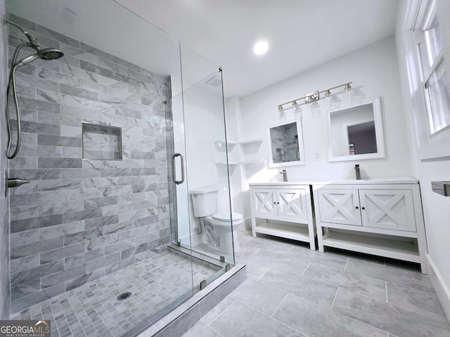 2400 Glenrock Dr, Decatur, GA 30032 - bathroom with a shower stall, double vanity, toilet, tile patterned floors, and recessed lighting