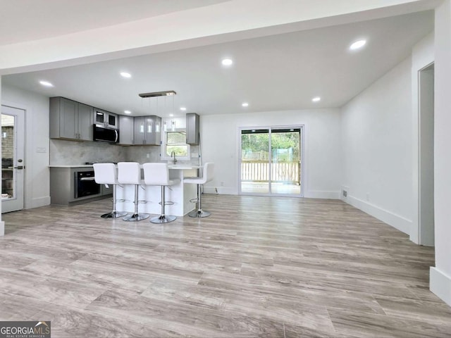 2400 Glenrock Dr, Decatur, GA 30032 - living area featuring recessed lighting, light wood-style floors, and baseboards