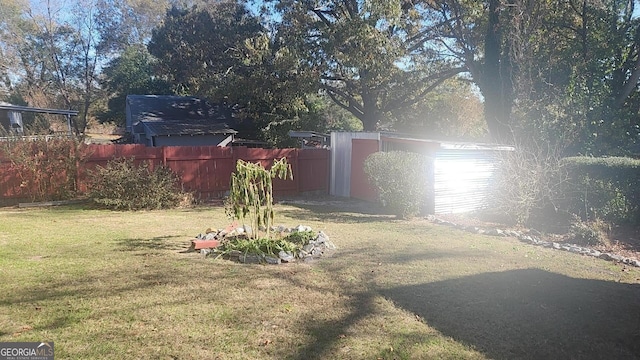 5802 Blueridge Dr, Columbus, GA 31907 - view of yard with an outdoor structure and a storage shed