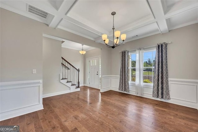 47 Whitley Ct, Dallas, GA 30157 - foyer with coffered ceiling, stairs, a chandelier, wood finished floors, and beamed ceiling