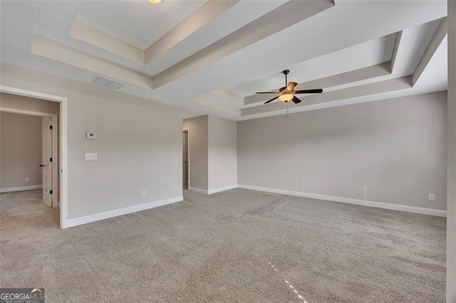 47 Whitley Ct, Dallas, GA 30157 - carpeted spare room featuring a raised ceiling, baseboards, and a ceiling fan