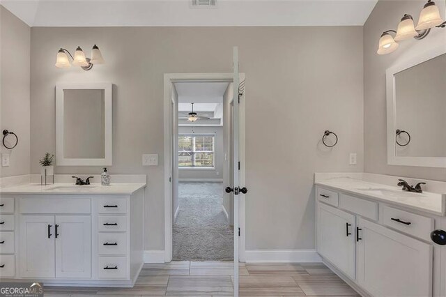 47 Whitley Ct, Dallas, GA 30157 - full bath featuring baseboards, two vanities, and a ceiling fan
