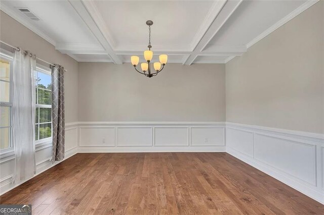 47 Whitley Ct, Dallas, GA 30157 - unfurnished room featuring coffered ceiling, hardwood / wood-style flooring, a chandelier, beam ceiling, and wainscoting