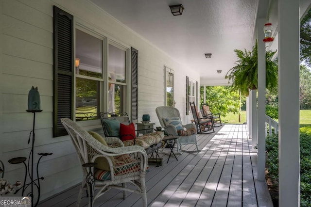 wooden deck featuring a porch