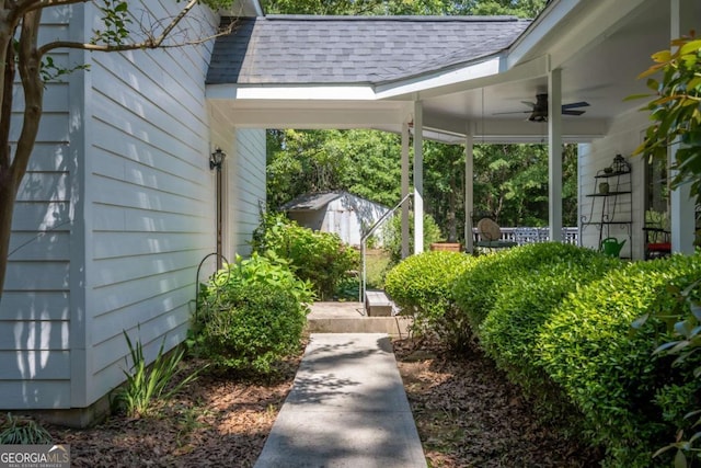 view of yard featuring ceiling fan