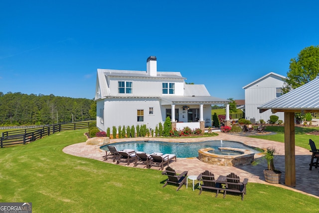 785 Carl Davis Rd, Monroe, GA 30656 - rear view of property featuring a pergola, a chimney, a patio area, and metal roof