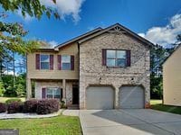620 Sedona Loop, Hampton, GA 30228 - view of front of home featuring a garage and concrete driveway