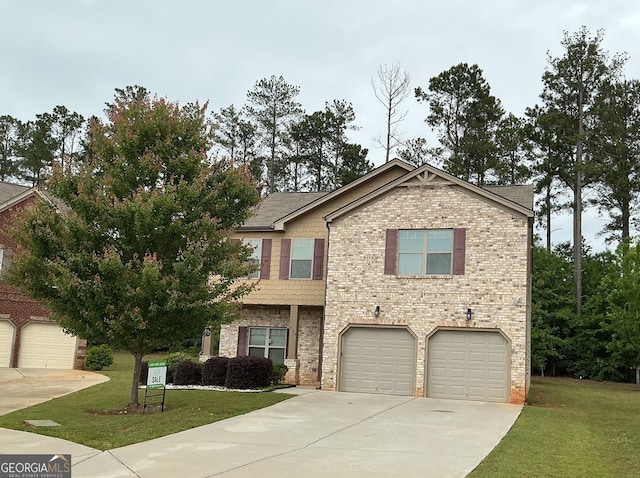 620 Sedona Loop, Hampton, GA 30228 - view of front of home with driveway, a front yard, a garage, and brick siding