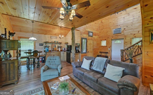315 Call Wright Rd, Ellijay, GA 30540 - living room featuring wood walls, ceiling fan, wood finished floors, wooden ceiling, and lofted ceiling