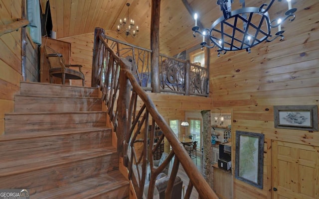 315 Call Wright Rd, Ellijay, GA 30540 - stairway with a chandelier, wooden walls, wooden ceiling, and high vaulted ceiling