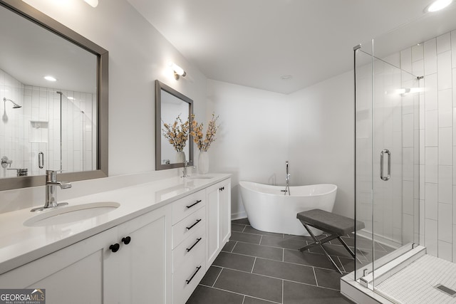 260N 18th St Unit 10326, Atlanta, GA 30363 - full bathroom with a shower stall, tile patterned flooring, a soaking tub, and double vanity