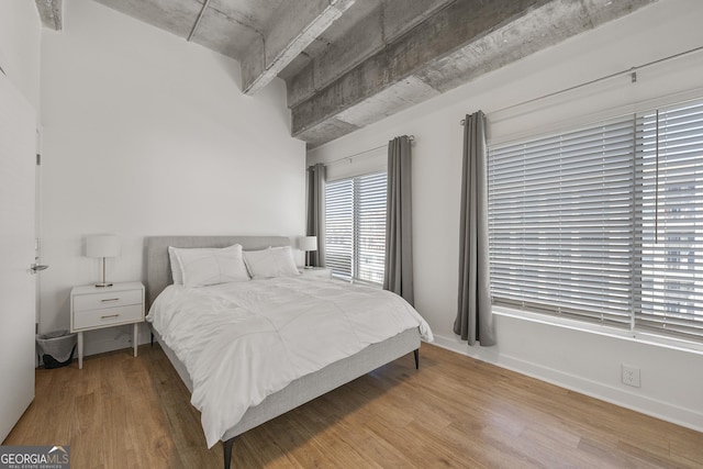 260N 18th St Unit 10326, Atlanta, GA 30363 - bedroom with wood finished floors and baseboards